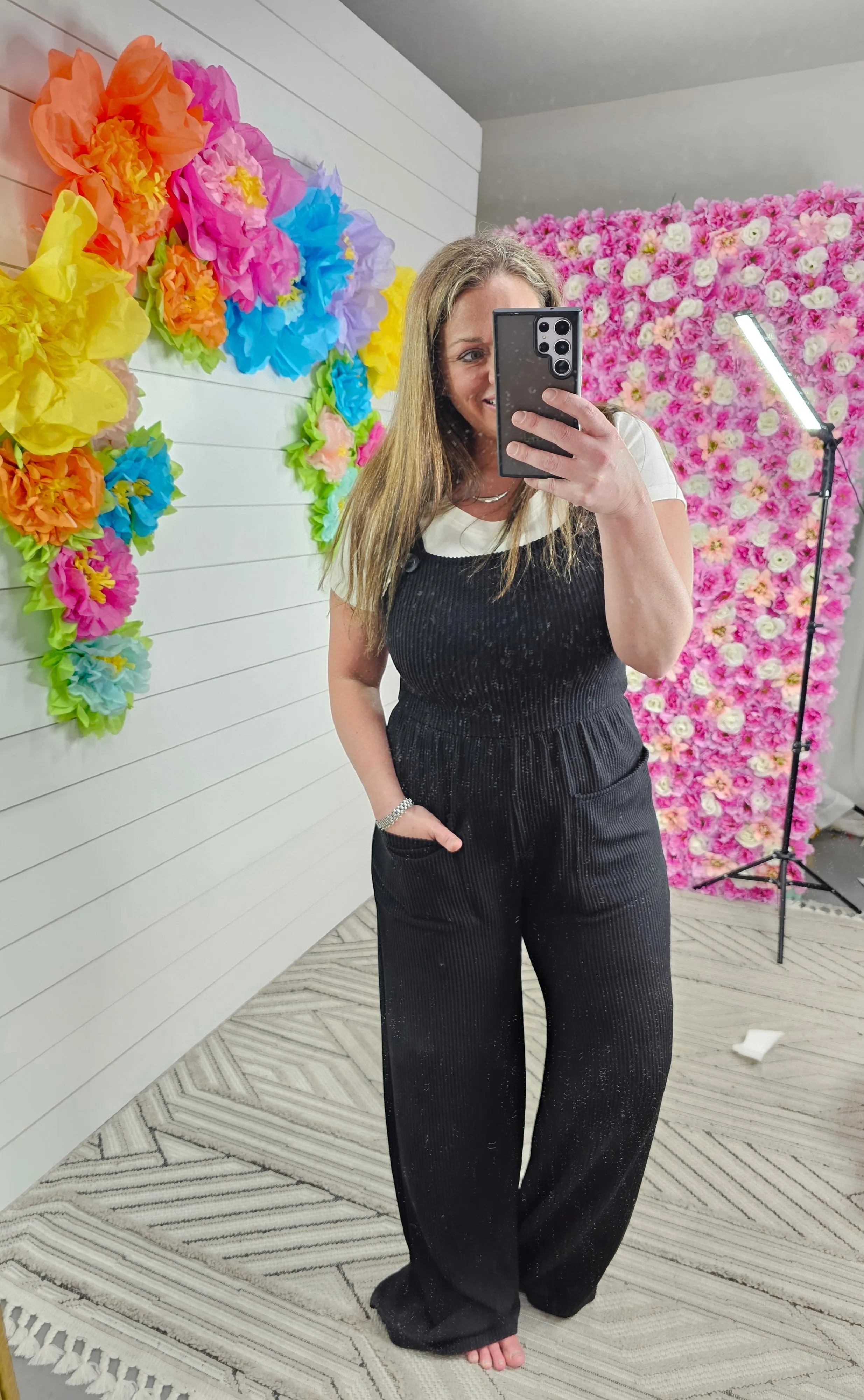 BLACK RIBBED KNIT JUMPSUIT